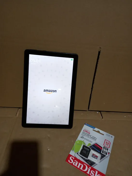 BOXED AMAZON FIRE HD10 TABLET WITH SANDISK 32GB CARD