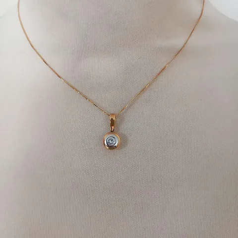 18CT GOLD RUBOVER PENDANT ON A CHAIN , SET WITH A NATURAL DIAMOND