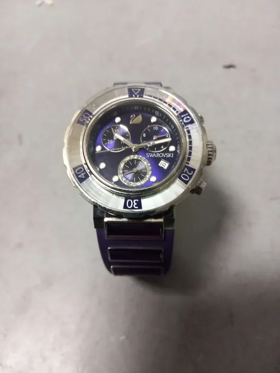 SWAROVSKI 1088675 STAINLESS STEEL 50M SWISS MADE WRIST WATCH AND PURPLE RUBBER STRAP 