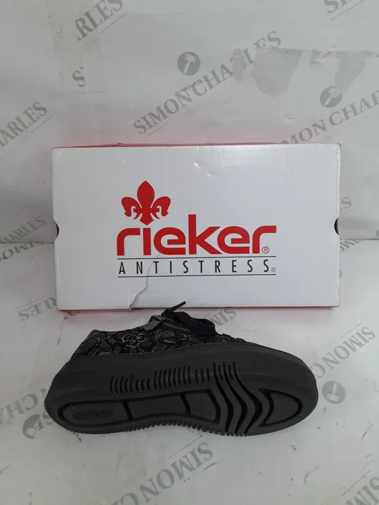 BOXED PAIR OF RIEKER FLORAL TRAINERS IN BLACK SIZE 4