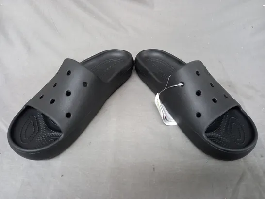 PAIR OF CROCS SLIDERS IN BLACK UK SIZE M11/W12