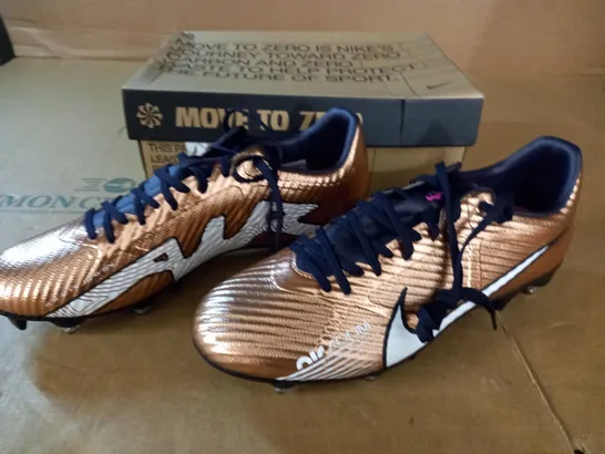 PAIR OF NIKE ZOOM VAPOR 15 ACAD SG-PRO BOOTS IN GOLD - UK 7