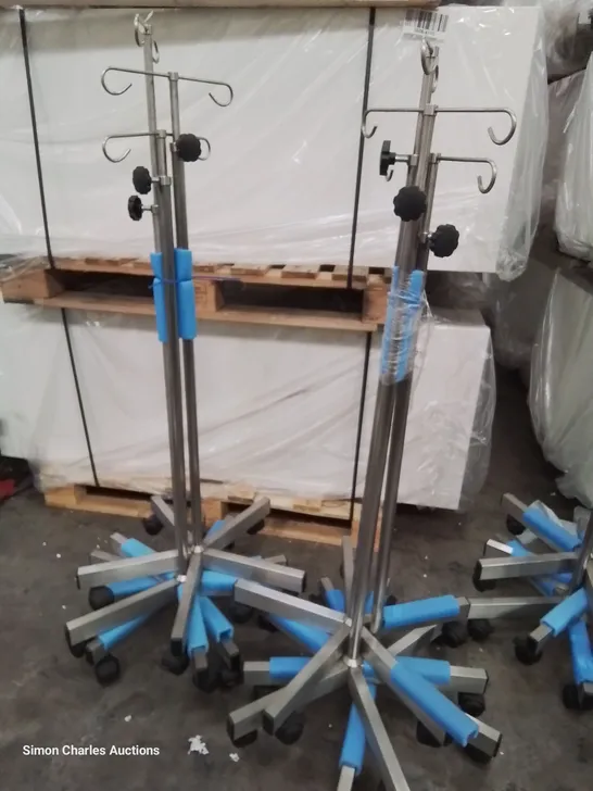 6 ASSORTED STAINLESS STEEL WHEELED DRIP STANDS