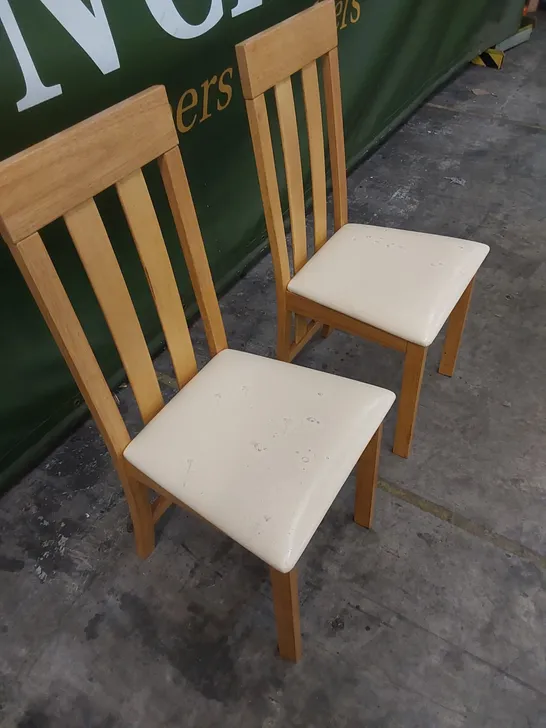 SET OF 2 DESIGNER DINING CHAIRS WITH IVORY SEAT PADS