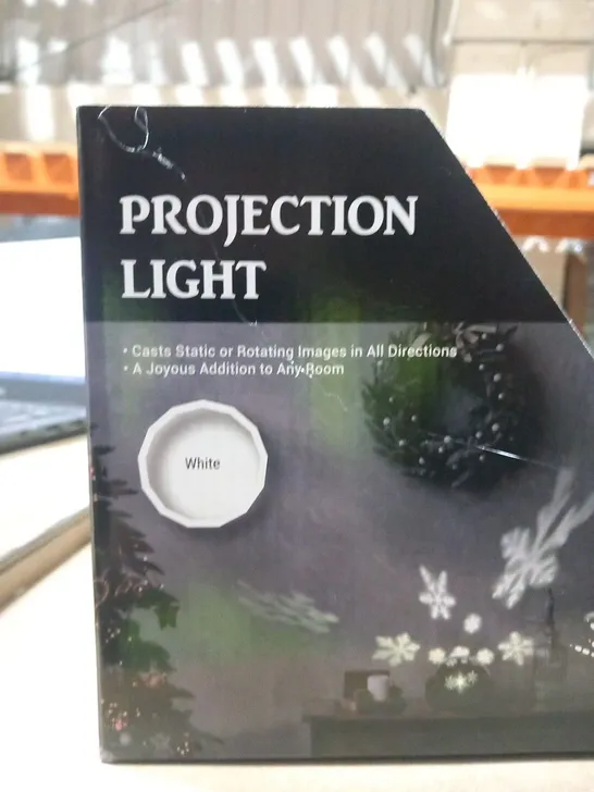 FOUR BRAND NEW BOXED WHITE SNOWFLAKE PROJECTION LIGHTS