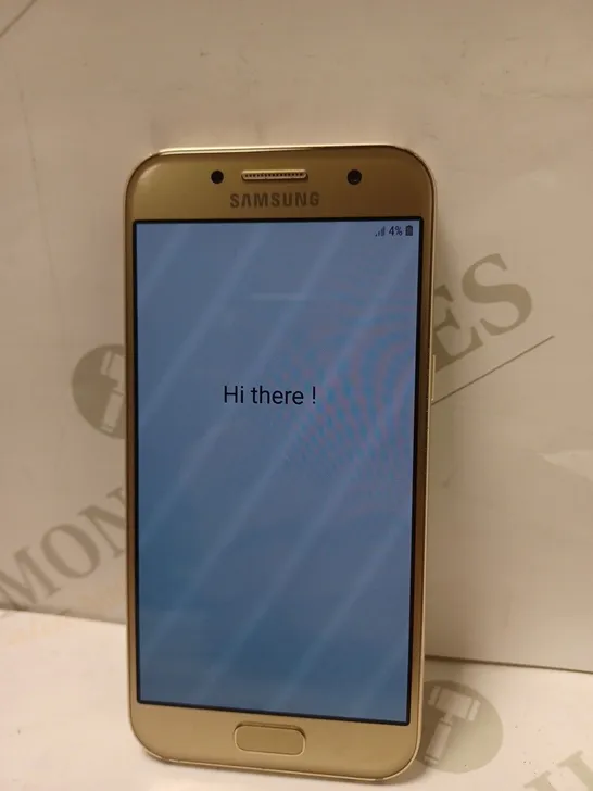 BOXED SAMSUNG GALAXY A3 MOBILE PHONE IN GOLD