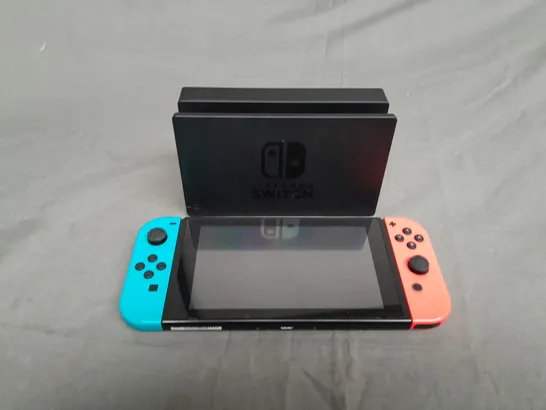 NINTENDO SWITCH AND CHARGING DOCK