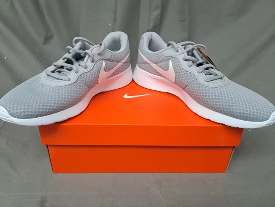 BOXED PAIR OF NIKE TANJUN SHOES IN GREY/WHITE UK SIZE 11