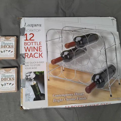 BOX OF APPROXIMATELY 10 ASSORTED HOUSEHOLD ITEMS TO INCLUDE TOPPER DECKS WATERCOLOUR WINGS, 12-BOTTLE WINE RACK, ETC