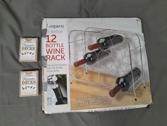 BOX OF APPROXIMATELY 10 ASSORTED HOUSEHOLD ITEMS TO INCLUDE TOPPER DECKS WATERCOLOUR WINGS, 12-BOTTLE WINE RACK, ETC