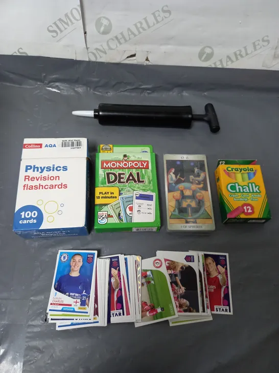 BOX OF APPROXIMATELY 15 ASSORTED ITEMS TO INCLUDE - CRAYOLA, MONOPOLY DEAL, FOOTBALL CARDS ETC