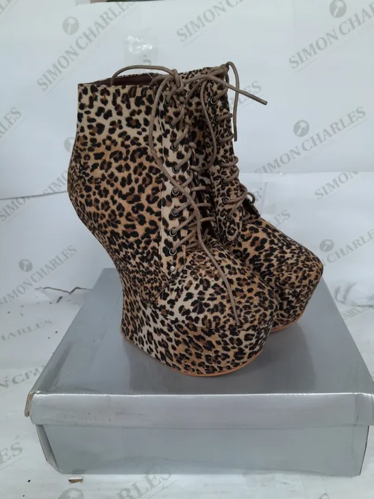 BOXED PAIR OF CASANDRA PLATFORM LACE UP HEEL BOOT IN LEOPARD SUEDE SIZE 7