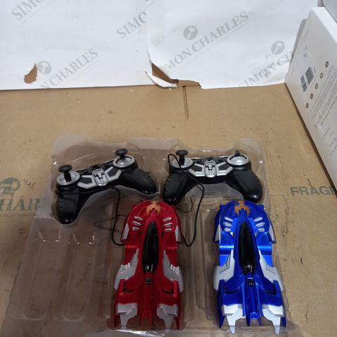 BELL AND HOWELL SET OF 2 RADICAL RACERS REMOTE CONTROL CARS