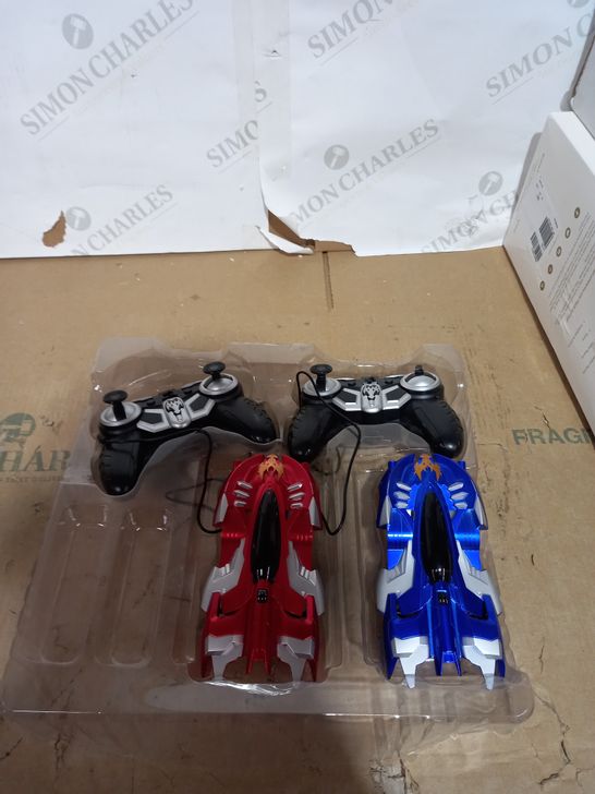 BELL AND HOWELL SET OF 2 RADICAL RACERS REMOTE CONTROL CARS