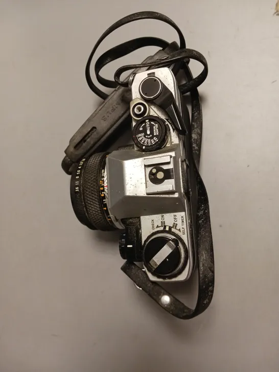 OLYMPUS FILM CAMERA OM 10 LEATHER STRAP INCLUDES MANUAL ADAPTOR