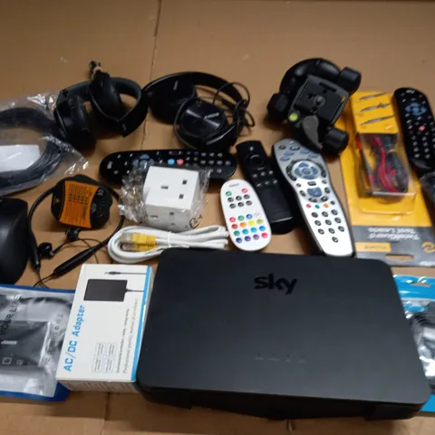 lot of assorted tech items to include various remote controls, portable card reader and charging cables