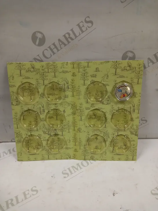 WINNIE THE POOH COMMEMORATIVE COIN COLLECTION WITH STARTER COIN 