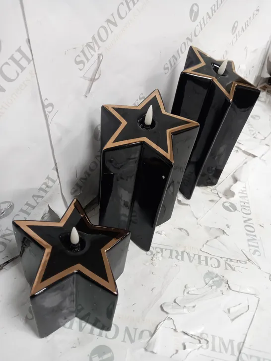 HOME REFLECTIONS CERAMIC STAR PRE-LIT CANDLES - BLACK