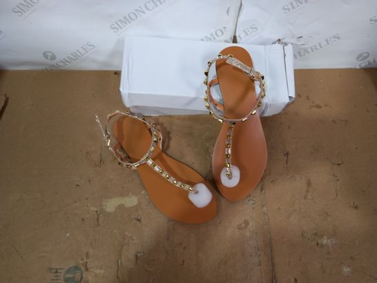 BOXED PAIR OF DESIGNER GOLD STUDDED SANDALS SIZE 40