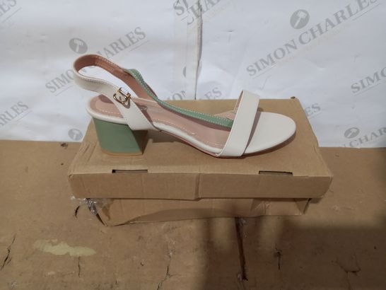 BOXED PAIR OF YIZUCAI HIG HEELS SIZE 41