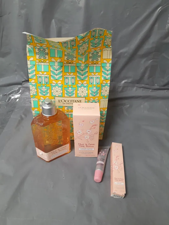 L'OCCITANE BATH AND BODY GIFT SET TO INCLUDE SHOWER GEL, LIP BALM AND HAND CREAM