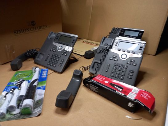 LOT OF APPROX 8 ASSORTED HOUSEHOLD ITEMS TO INCLUDE: CISCO PHONE SYSTEMS, SONIC SCRUBBER, STAPLERS
