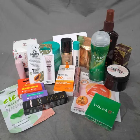 APPROXIMATELY 20 ASSORTED COSMETIC PRODUCTS TO INCLUDE WILD LIP BALM, MAX FACTOR FOUNDATION, PHILIP KINGSLEY DEEP CONDITIONING TREATMENT ETC