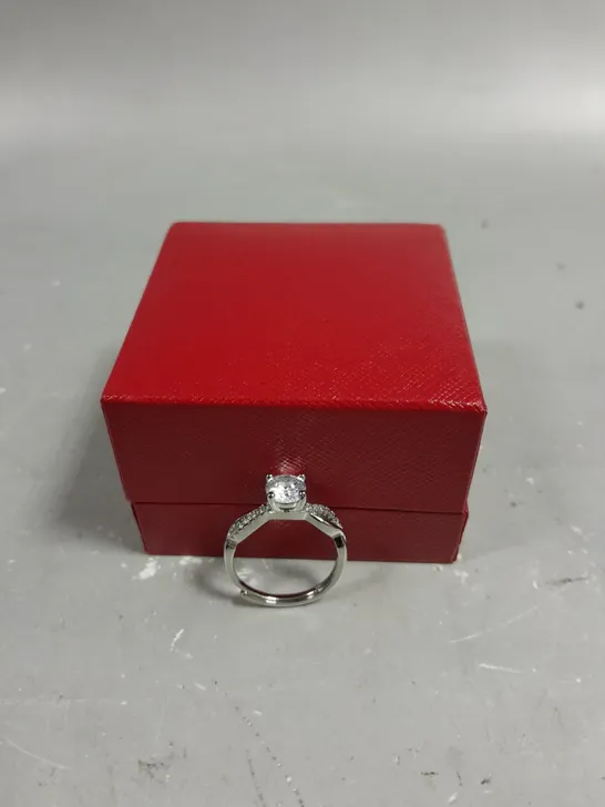 DESIGNER STONE TOPPED INFINITY RING 