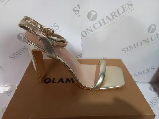 BOXED PAIR OF LADIS GLAMOROUS HEELS IN GOLD SIZE UK7 