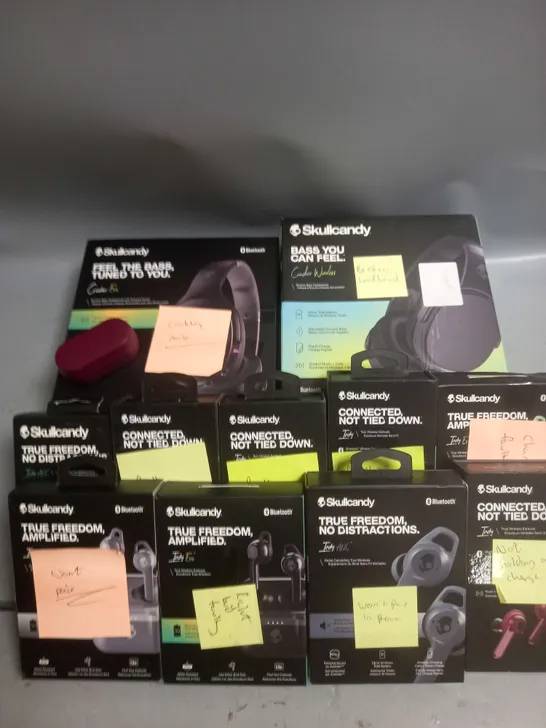 BOX OF APPROXIMATELY 50 ASSORTED FAULTY SKULLCANDY HEADSETS IN VARIOUS STYLES AND COLOURS