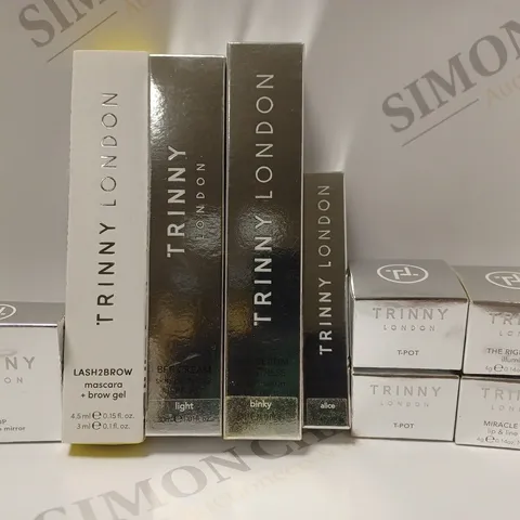 box of APPROX 8 ASSORTED TRINNY LONDON PRODUCTS TO INCLUDE LASH2BROW MASCARA+BROW GEL, TINTED SERUM, THE RIGHT LIGHT ILLUMINATOR, ETC 