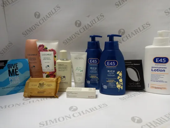 LOT OF APPROX 15 ASSORTED BEAUTY PRODUCTS TO INCLUDE LIZ EARLE BODY CREAM, E45 RICH BODY LOTION, THE BODY SHOP SOAP, RARE BEAUTY DEWY LIQUID BLUSH, ETC