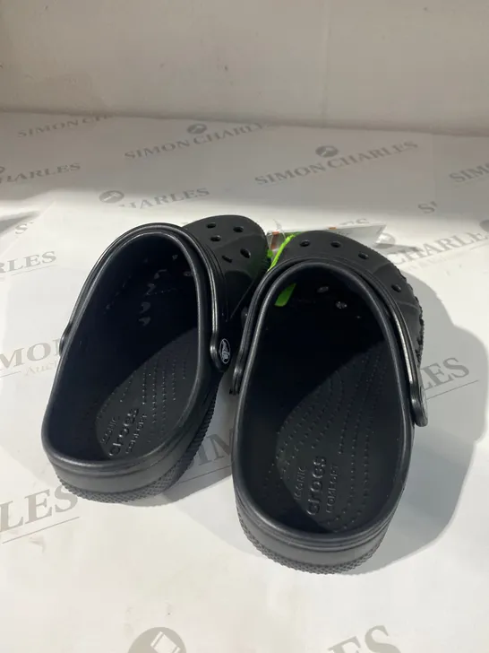 PAIR OF BLACK CROCS SIZE 33-34