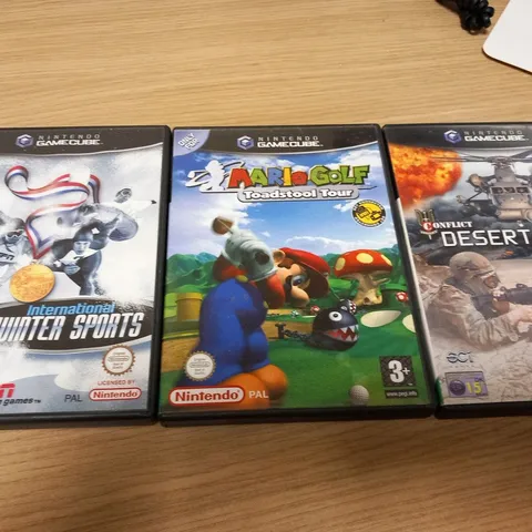 3 ASSORTED GAMECUBE GAMES; INTERNATIONAL WINTER SPORTS, MARIO GOLF TOADSTOOL TOUR AND CONFLICT DESERT STORM