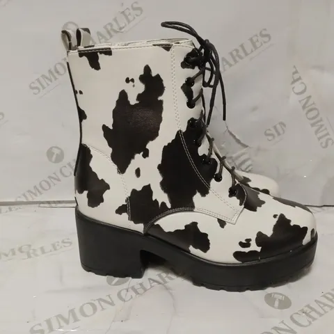 PAIR OF KOI DESIGNER VEGAN COW PRINT PLATFROM HEELED ANKLE BOOTS - SIZE 6