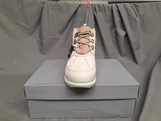 BOXED PAIR OF VIONIC HIGH TOP BOOTS IN CREAM SIZE 7