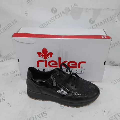 BOXED PAIR OF RIEKER LOW WEDGE TRAINERS IN BLACK SIZE 6