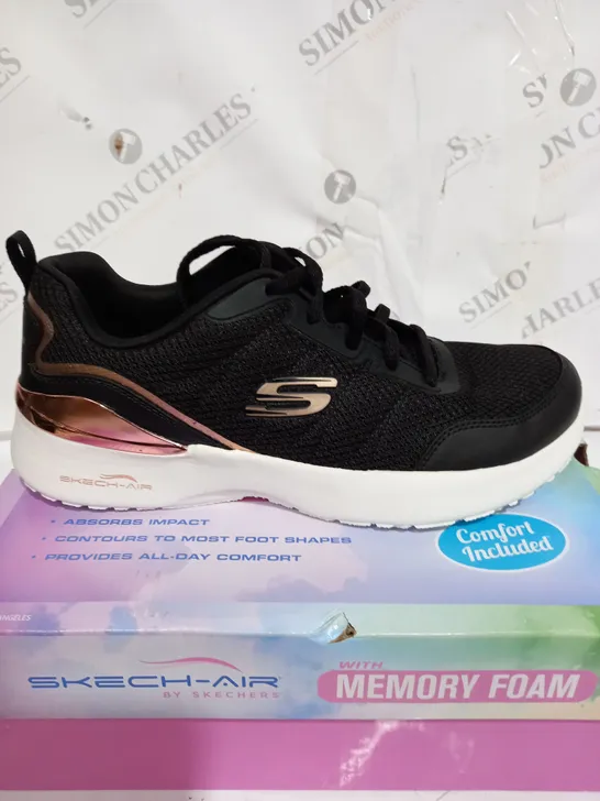 PAIR OF SKECHERS BLACK AND GOLD SKECH-AIR DYNAMIGHT TRAINERS SIZE 6