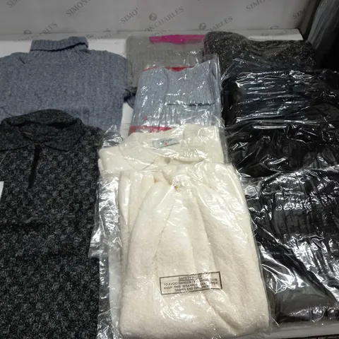 APPROXIMATELY 10 ASSORTED CLOTHING ITEMS IN VARIOUS SIZES AND COLOURS TO INCLUDE JUMPERS, SWEATERS, ETC