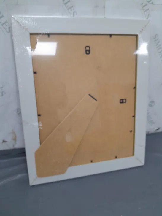 SEALED PICTURE FRAME APPROXIMATELY 36CM X 43.5CM 