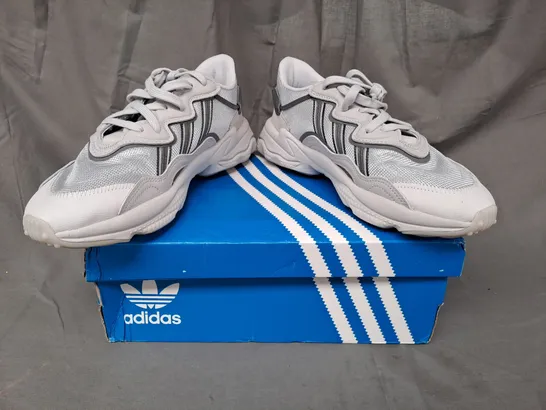 BOXED PAIR OF ADIDAS OZWEEGO SHOES IN GREY UK SIZE 9