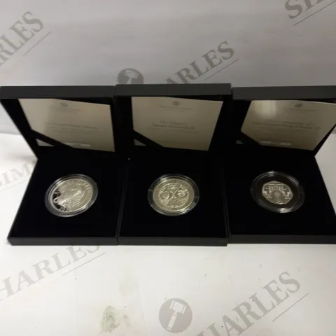 SET OF 3 COMMEMORATIVE COINS, DESIGNS VARY 