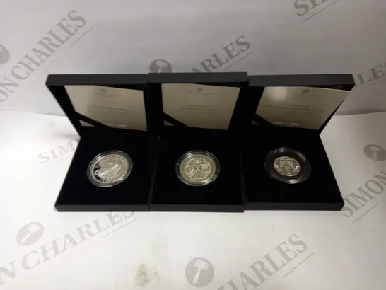 SET OF 3 COMMEMORATIVE COINS, DESIGNS VARY 