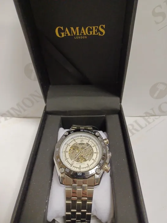 GAMAGES LONDON SKELETON FACE WATCH WITH SILVER BRACELET STRAP