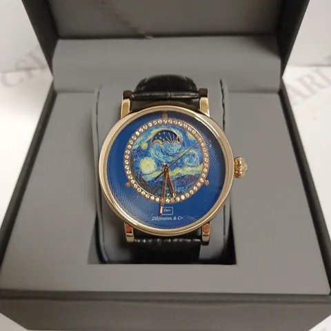 ZIHLMANN & CO ROSE GOLD EFFECT WATCH WITH BLACK LEATHER STRAP AND BLUE PICASSO MOON FACE