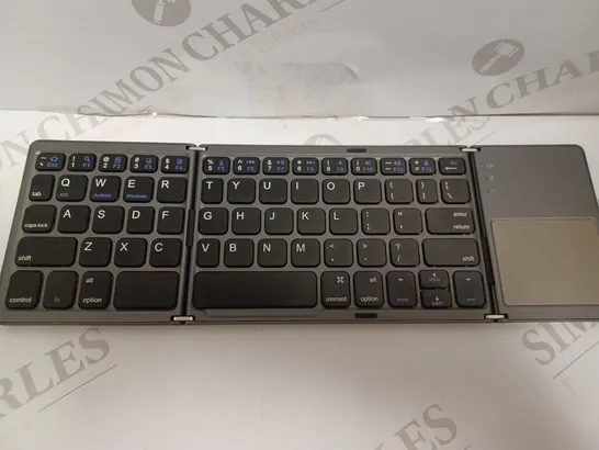 MCBAZEL FOLDABLE BLUETOOTH KEYBOARD WITH TOUCHPAD