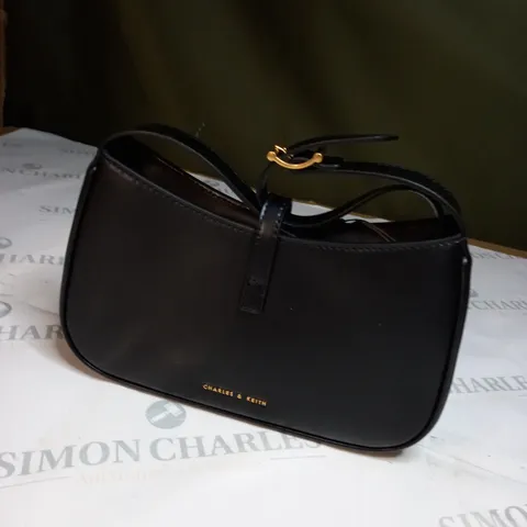 CHARLES AND KEITH BLACK STRINGED BAG 