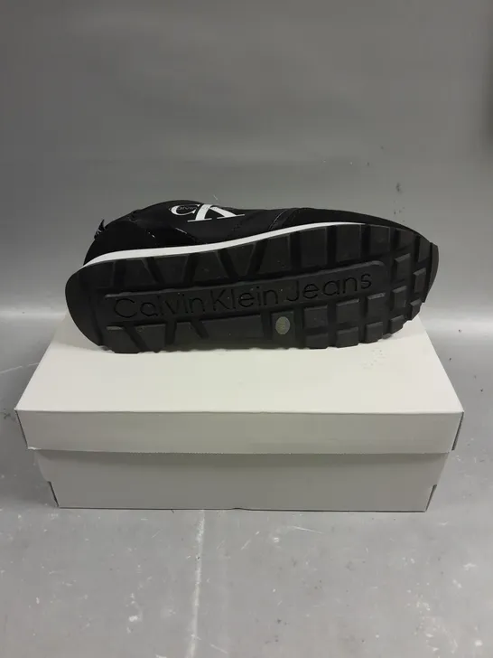 BOXED PAIR OF CALVIN KLEIN CAYLE BLACK FABRIC TRAINERS - 8