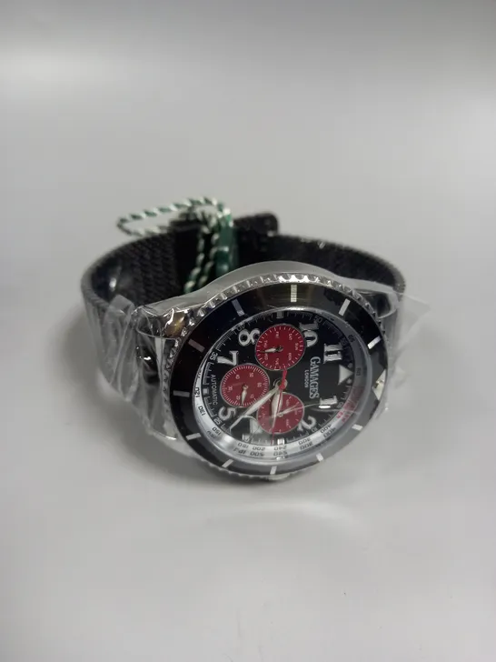 BOXED GAMAGES CONTEMPORARY SPORTS STEEL BLACK DIAL WATCH 