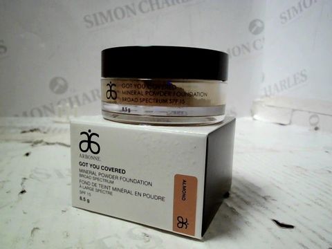 BOX OF APPROXIMATELY 94 ARBONNE - GOT YOU COVERED: MINERAL POWDER FOUNDATION. BROAD SPECTRUM SPF 15. ALMOND